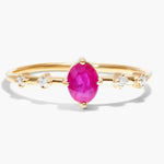 Luxury gemstone ring featuring vibrant colored stone with brilliant shine and classic design