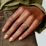 Vintage inspired gemstone ring with intricate design and sparkling center gemstone