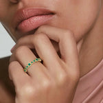 Vintage inspired gemstone ring with intricate design and sparkling center gemstone