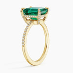 Glamorous gemstone ring with radiant cut stone and halo setting for luxury jewelry look
