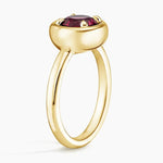 Modern lab grown diamond ring featuring colorful gemstone centerpiece in a sleek and sophisticated fine jewelry design
