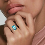 Bold gemstone ring with large center stone and statement design for eye catching look