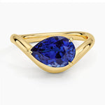 Elegant gemstone ring with blue color stone and shining white stones for luxury style