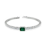 tennis bracelet with clear cubic zirconia stones in silver setting.
