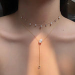 1.03 Ct Gold shell necklace pendant shaped like a seashell.