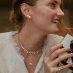 11.64 Ct Jade with gold necklace featuring green gemstone pendant.