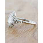 Dainty engagement rings with delicate diamond elegance and refined beauty