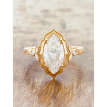 Toi et moi engagement ring with marquise diamond engagement ring style and vintage gold ring detailing.