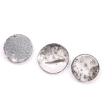 Three round rose cut lab grown salt and pepper diamonds with black and white galaxy inclusions on white background, rustic ethical conflict free loose diamonds for engagement ring or custom jewelry.