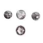 Round brilliant cut lab grown salt and pepper diamond featuring natural black and white galaxy-like inclusions with a faceted surface and translucent gray body tone.
