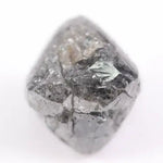 raw uncut diamond with natural rough crystal texture before cutting grey rough diamond