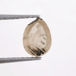 0.69 Ct natural grey brown pear cut diamond with soft earthy tones and elegant teardrop shape for timeless fine jewelry