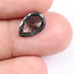 1.33 Ct black and white pear shape lab grown diamond with elegant facets for handmade rings