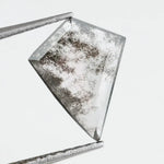 Kite-cut lab grown diamond with natural-style internal inclusions, geometric faceting, and transparent crystal body, photographed on a white background for ethical fine jewelry and custom engagement ring design.