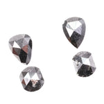 Natural salt and pepper rose cut diamond set featuring pear, kite, and cushion shapes with gray inclusions, rustic natural diamond gemstones for custom engagement rings and fine jewelry making.