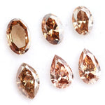Rare mix shape lab grown diamond lot featuring fancy brown lab grown diamonds, ethical loose diamonds for fine jewelry making, engagement rings, pendants, earrings and custom luxury jewelry designs.