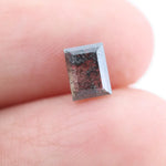 Baguette cut salt and pepper lab grown diamond with natural black inclusions, unique speckled pattern, transparent edges, ethically grown conflict free gemstone for modern jewelry