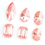 Loose fancy pink lab grown diamonds in marquise, pear, oval and emerald step cuts, perfect lab created diamonds for fine jewelry making, engagement rings and custom jewelry designs.