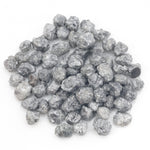 dark grey natural diamond with a rugged rough surface for wholesale diamond buyers