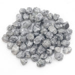 dark grey natural diamond with a rugged rough surface for wholesale diamond buyers