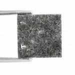 Square step-cut lab grown diamond with crisp geometric facets, high clarity, and modern symmetrical design on a clean white background