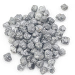 dark grey natural diamond with a rugged rough surface for wholesale diamond buyers