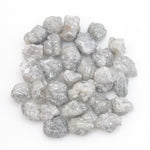 grey white diamond with a natural uneven surface for handmade jewelry creations