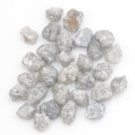 grey white diamond with a natural uneven surface for handmade jewelry creations