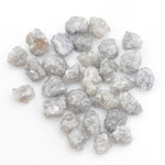 grey white diamond with a natural uneven surface for handmade jewelry creations