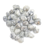 grey white natural diamond with a rugged unpolished surface for jewelry making