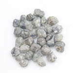 grey white natural diamond with a rugged unpolished surface for jewelry making