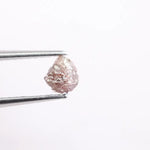Pink diamond earrings in fine jewelry setting