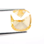 1.74 Ct yellow cushion cut lab created diamond loose stone with vibrant golden color and softly rounded square shape for custom engagement ring or luxury jewelry setting.