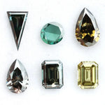 Fancy color lab grown diamond mixed shape CVD loose diamonds including emerald, pear, round and triangle cut for fine jewelry making.