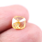 1.74 Ct yellow cushion cut lab created diamond loose stone with vibrant golden color and softly rounded square shape for custom engagement ring or luxury jewelry setting.