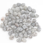 light grey natural diamond with a rough unpolished surface for custom jewelry creation