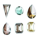Fancy color lab grown diamond mixed shape CVD loose diamonds including emerald, pear, round and triangle cut for fine jewelry making.