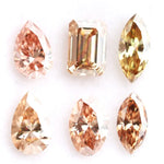 Fancy color lab grown diamond mix shape CVD loose diamonds including pear oval marquise emerald cut champagne and peach diamonds for engagement ring and custom fine jewelry making.