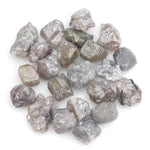 grey brown natural diamond with a rough uncut surface for collectors