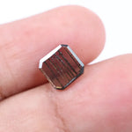0.88 Ct brown Emerald cut lab grown diamond loose stone with geometric shape and rich brown color sparkle.