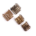 Emerald cut champagne brown lab grown diamond with step cut facets and visible natural-style inclusions, sustainable loose diamond for custom engagement ring or fine jewelry design.