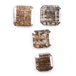 Emerald cut champagne brown lab grown diamond with step cut facets and visible natural-style inclusions, sustainable loose diamond for custom engagement ring or fine jewelry design.