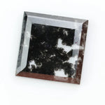 Square cut lab grown diamond with step facets, high clarity, mirror-like reflections, and visible inclusions on a neutral background