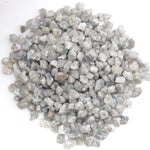 grey white earth mined diamond in natural rough form for jewelry crafting