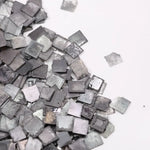 Fancy grey black lab grown rough diamond carré cut square slice loose diamond for custom jewelry making and modern engagement ring design.