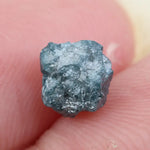 loose raw diamonds with natural rough surfaces suitable for custom jewelry creations.