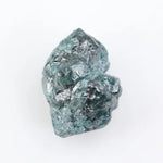 loose raw diamonds displaying natural rough surfaces for custom jewelry and gemstone projects.