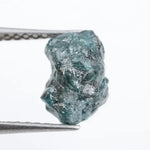 loose raw diamonds displaying natural rough surfaces for custom jewelry and gemstone projects.