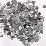 Fancy grey black lab grown rough diamond lot with square slice Carré cut tiles, raw CVD diamonds for custom jewelry making and unique engagement ring designs.
