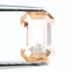 0.53 Ct fancy brown emerald cut lab grown diamond with elegant step cut facets, premium loose diamond for custom jewelry designs.
